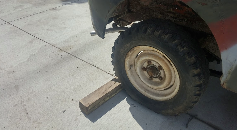 To keep your car from rolling, throw a block of wood behind your wheel.